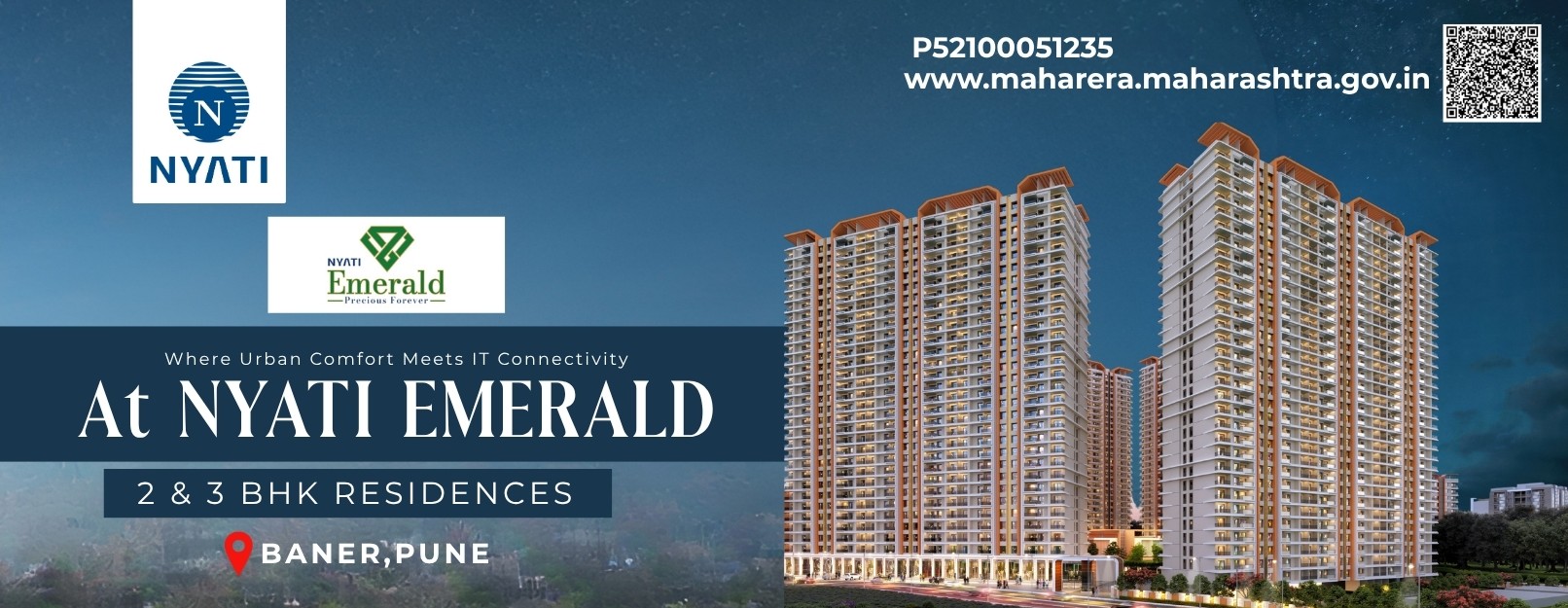 High-angle twilight view of the premium high-rise towers of Nyati Emerald in Baner Pune, showing beautifully lit luxury apartments and landscaped green gardens